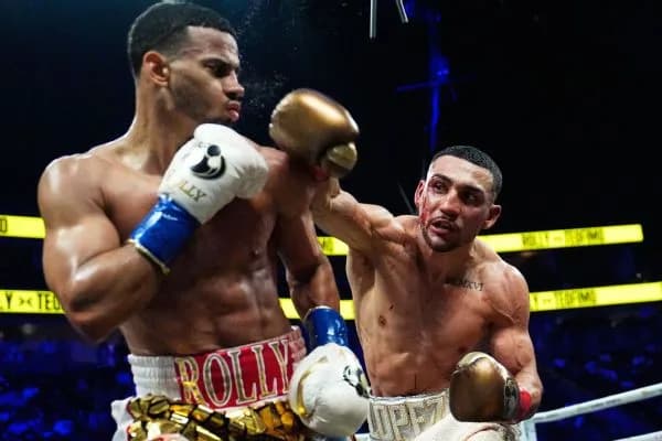 Lopez wrests Romero's WBA title by decision, now 3-weight champ